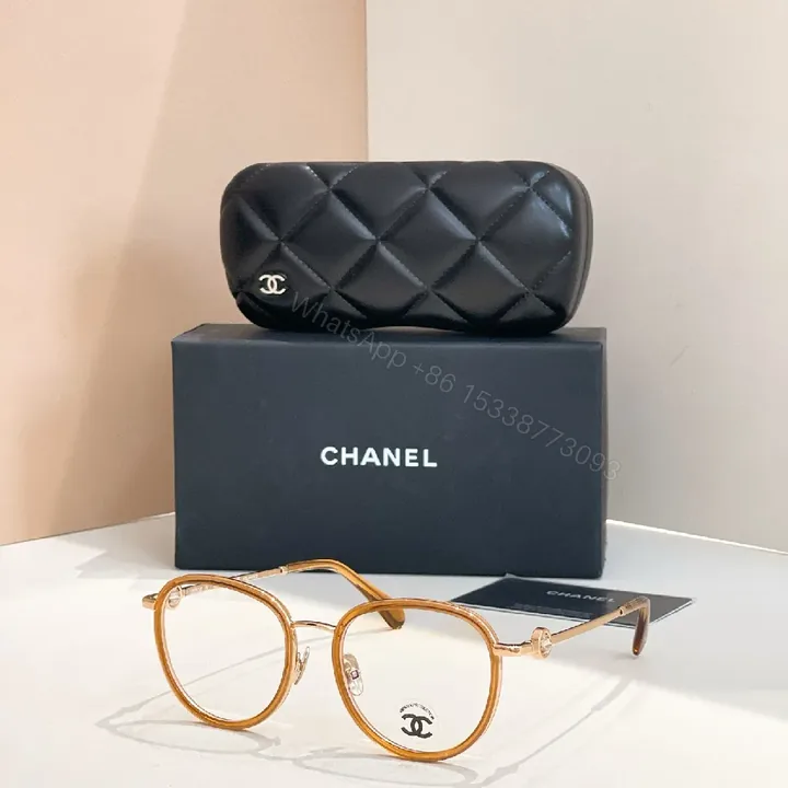 View 1 of Chic Quilted Clutch & Amber Eyewear Set - Elegant Luxury Pair
