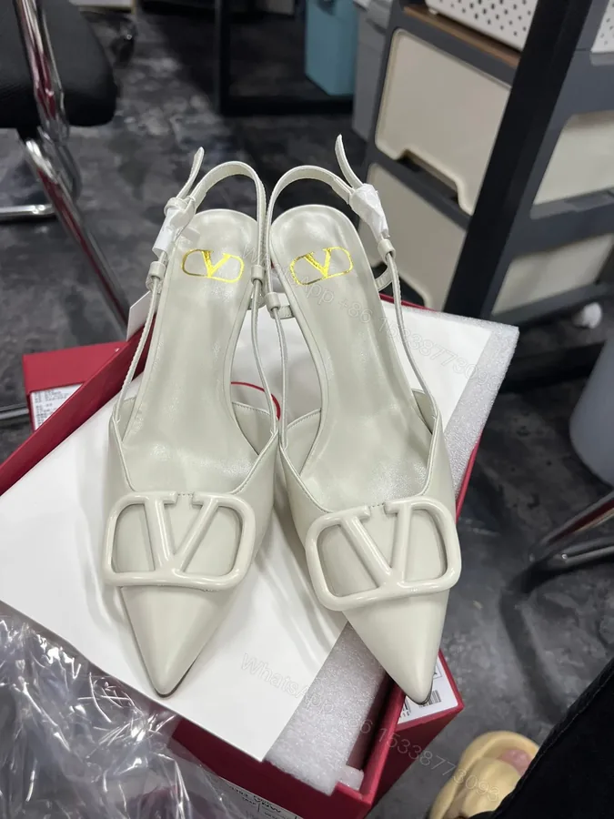 View 1 of Valentino Women White Slingback Leather Pumps
