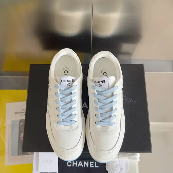 View 1 of Premium White Chanel-Style Leather Sneakers with Light Blue Laces