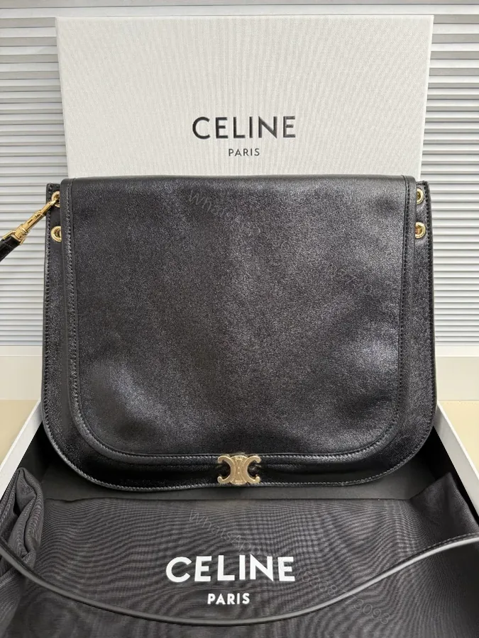 View 1 of Black Metallic Texture Shoulder Bag with Gold Accent