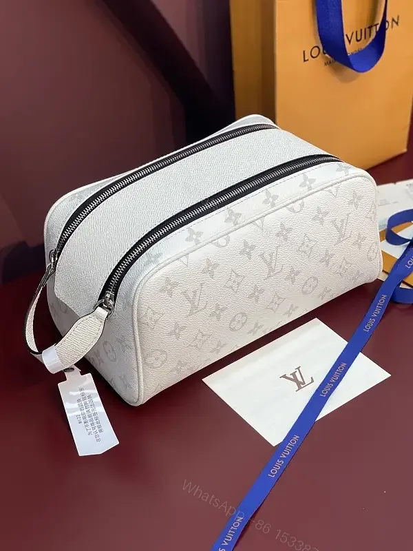 View 1 of White Leather Monogrammed Subtle LV-inspired Cosmetic Bag