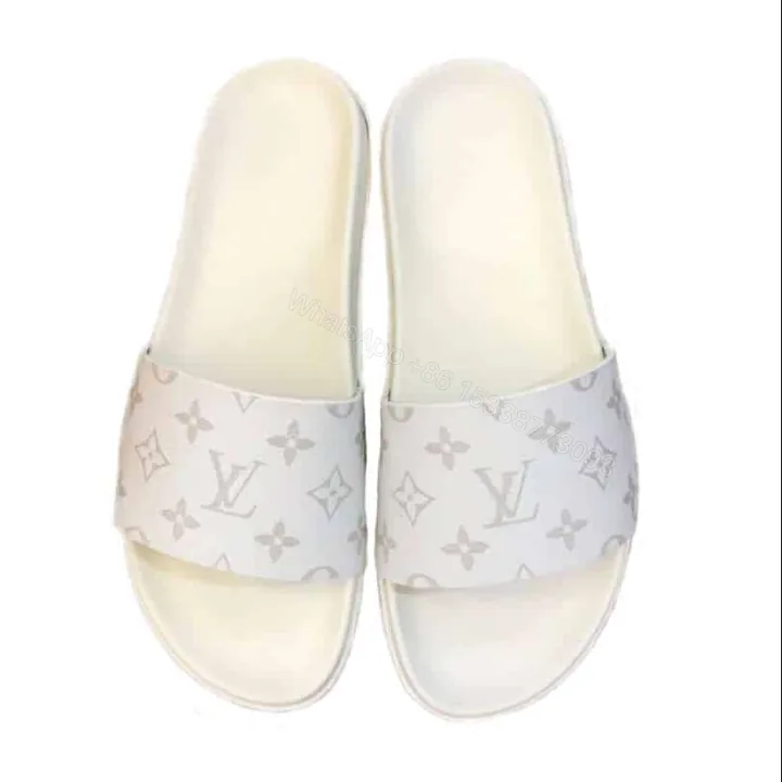 View 1 of LOUIS VUITTON WHITE MONOGRAM SLIDES – LVS43