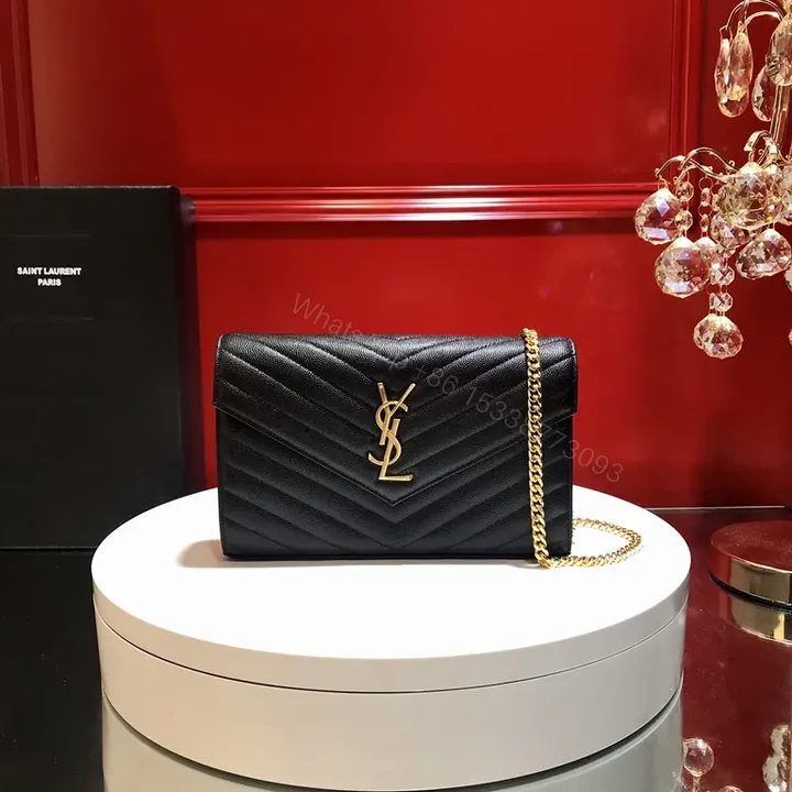 View 1 of Black Leather Chevron Clutch with Gold YSL Emblem - Luxury Evening Bag