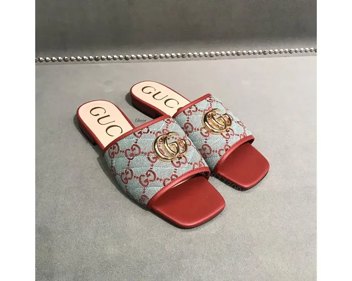 View 1 of Gucci GG Matelassé canvas flat sandals