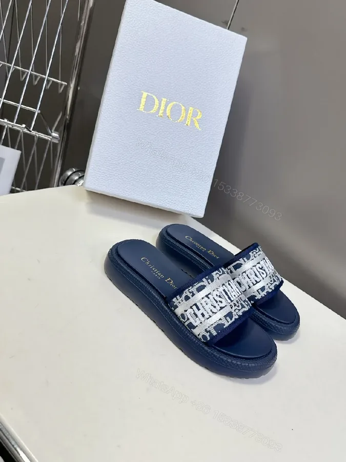 View 1 of Textured Navy Slides: Wide Logo Strap, Elevated Comfort