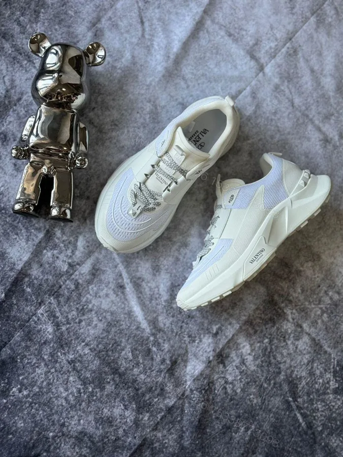 View 1 of Valentino Garavani True Act Lace-Up Sneakers