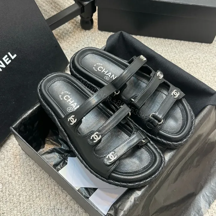 View 1 of Minimalist Black Leather Sandals with Subtle Logo Hardware