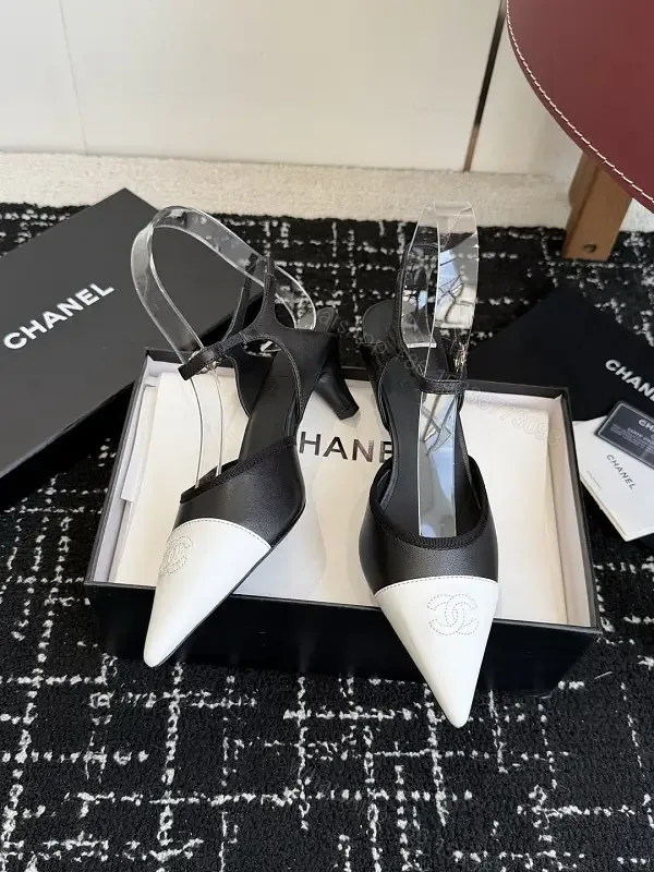 View 1 of Black White Leather Slingback Heels with Chanel Logo, Pointed Toe, 2-inch Heel