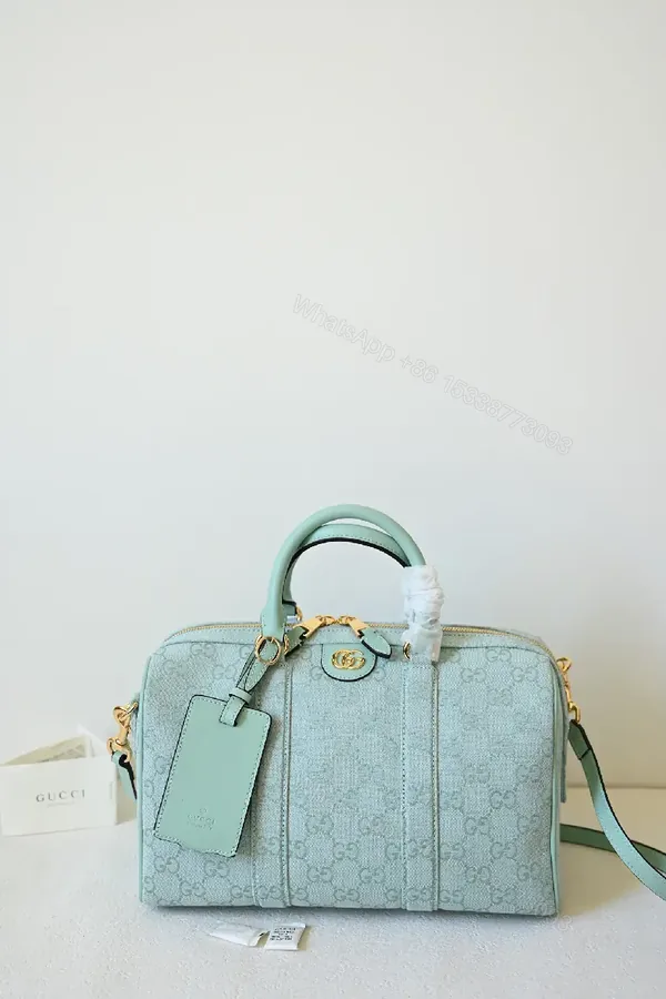 View 1 of Soft Mint GG Weekender Bag: Luxe Travel Carryall
