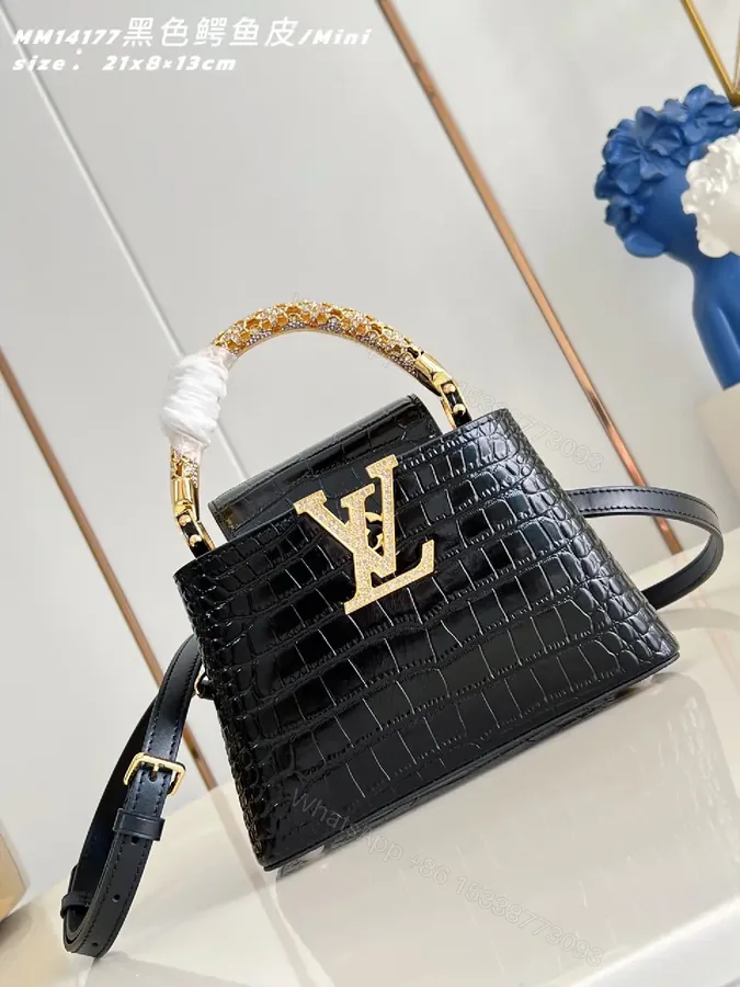 View 1 of Crocodile-Texture Mini Bag with Gold Emblem – Luxe Everyday Glam