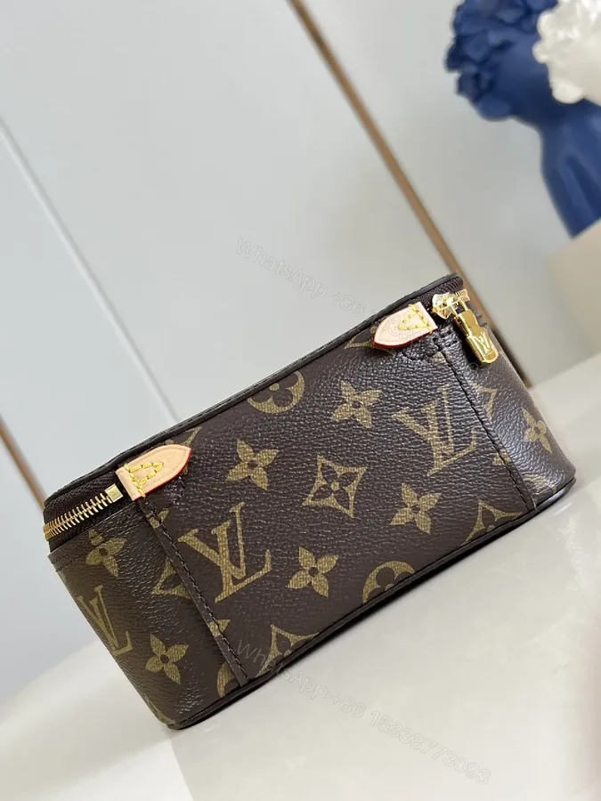 View 1 of Brown Monogram Canvas Compact Pouch with Gold Hardware Clutch
