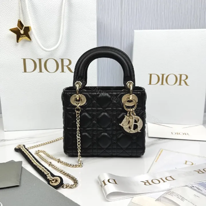 View 1 of Small Black Quilted Mini Bag with Gold Hardware - Elegant Compact Crossbody