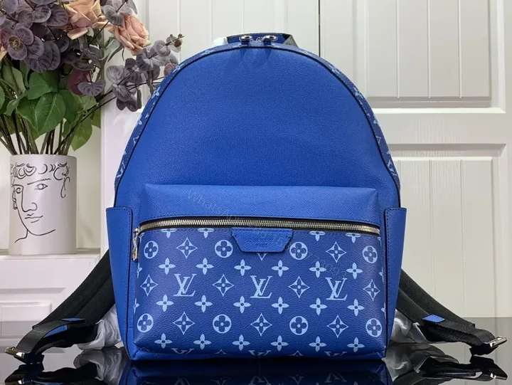 View 1 of Blue Monogram Luxe Backpack: Compact, Durable, Designer-Inspired