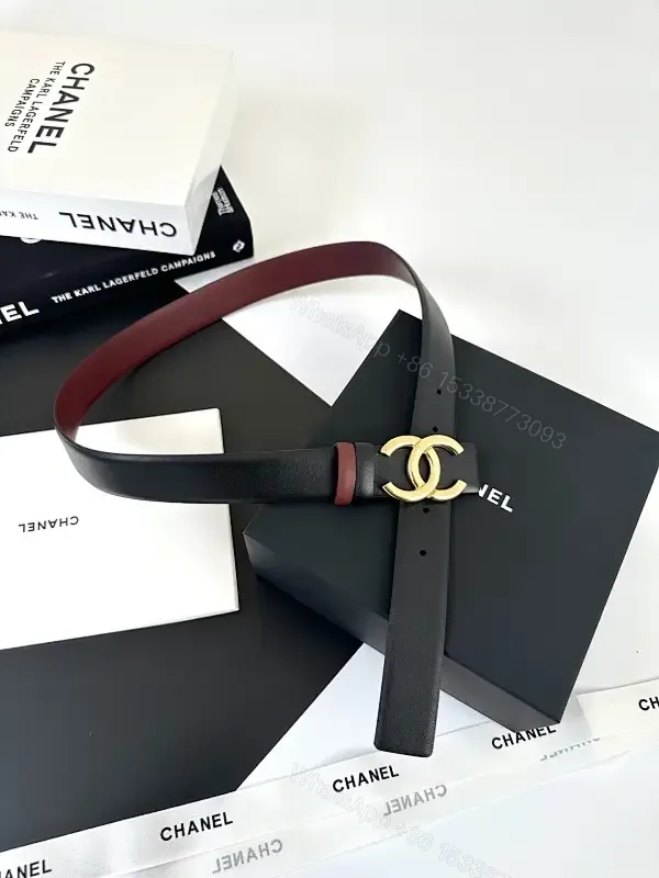 View 1 of Two-Tone Black/Burgundy Leather Belt with Gold Logo Buckle