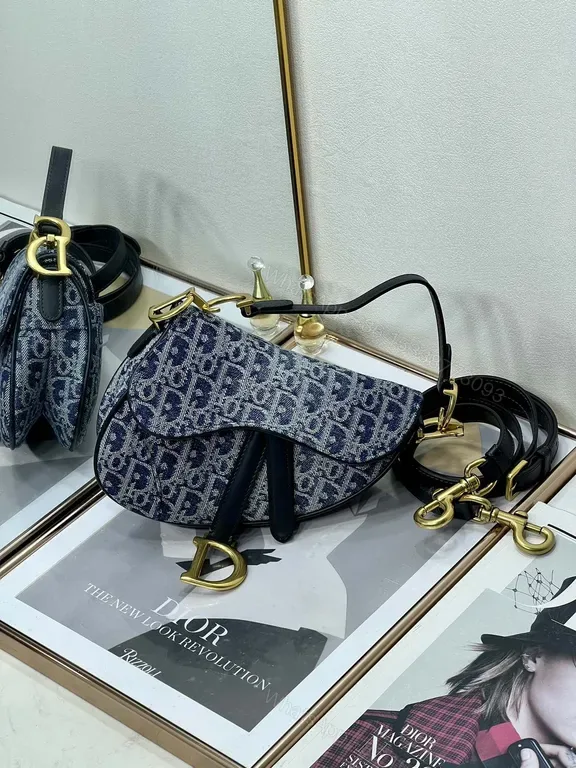 View 1 of Chic Denim Saddle Bag - Luxe Gold Hardware, Everyday Distinction