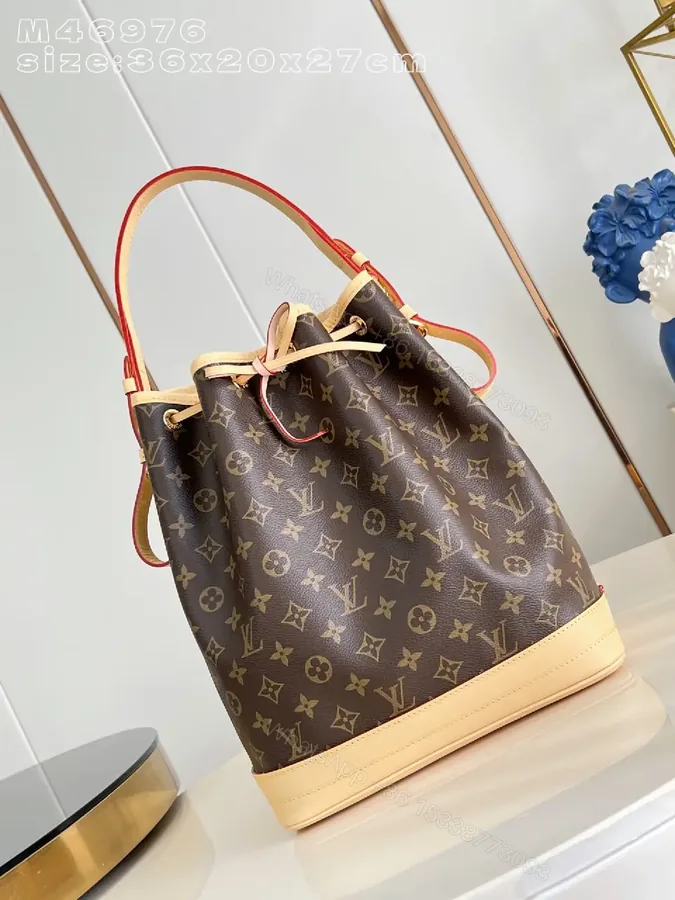 View 1 of Monogram Bucket Bag: Structured Luxury, Everyday Versatility