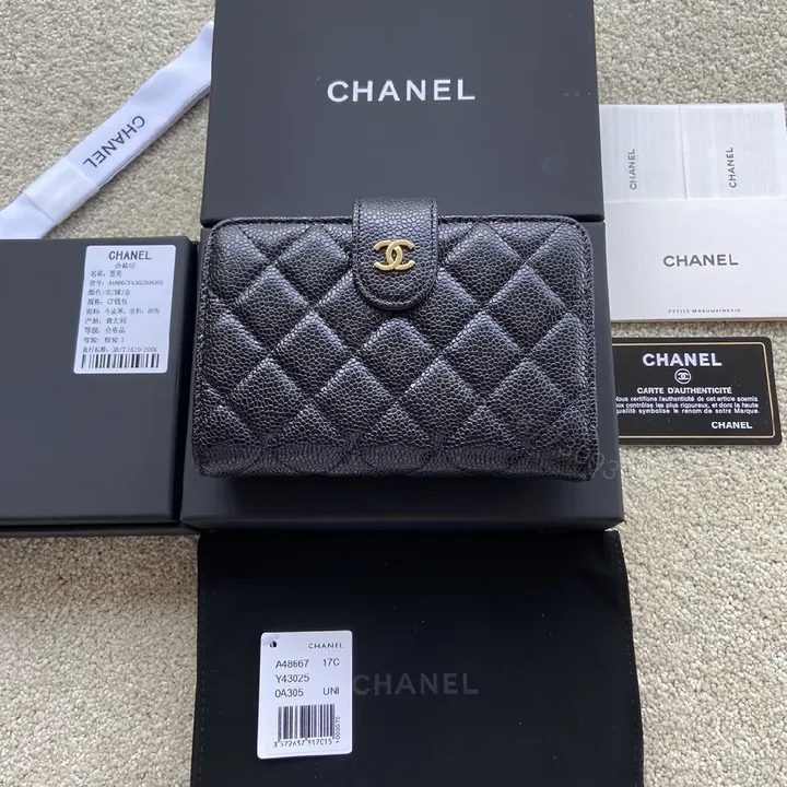 View 1 of Chic Quilted Black Wallet with Gold Clasp