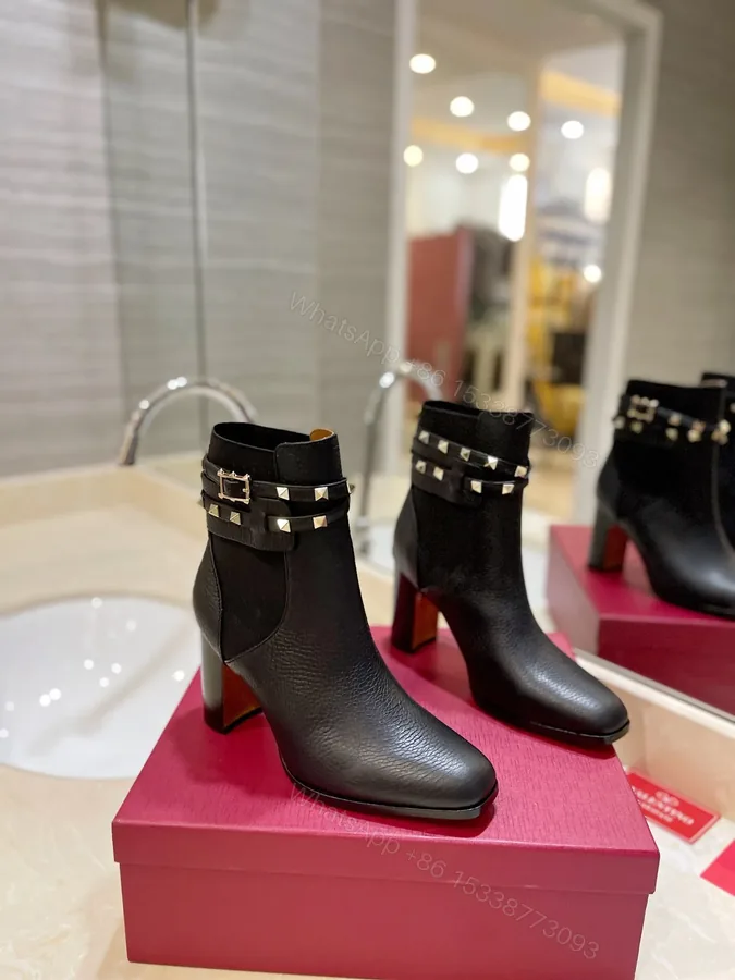 View 1 of Valentino Women Black Leather Studded Ankle Boots