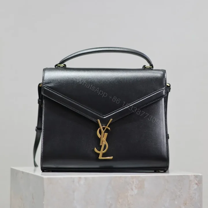View 1 of YSL CASSANDRA TOP HANDLE BAG MEDIUM BLACK SMOOTH LAMBSKIN GOLD HARDWARE