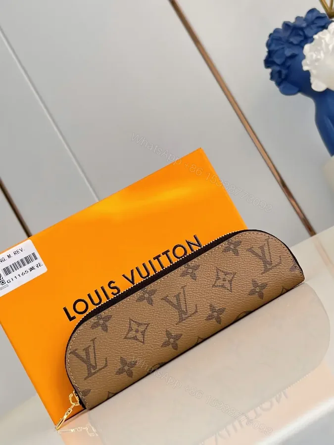 View 1 of Monogram Leather Compact Wallet: Signature Zip Closure