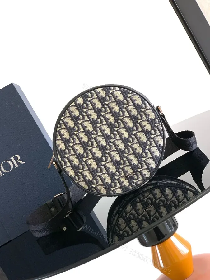 View 1 of Chic Round Crossbody Bag: Textured, Everyday Luxury