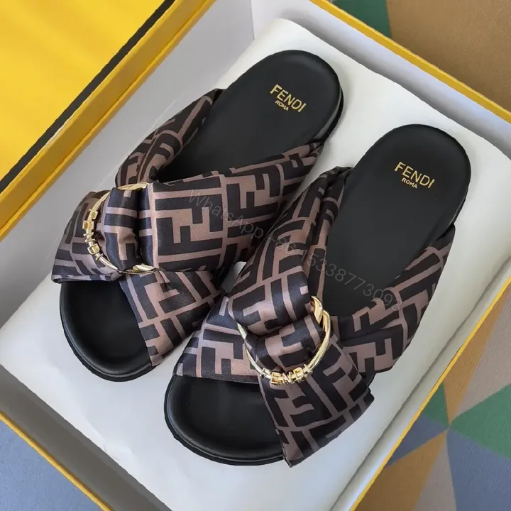 View 1 of Patterned Comfort: Monogram Luxe Slip-Ons for All-Day Elevation