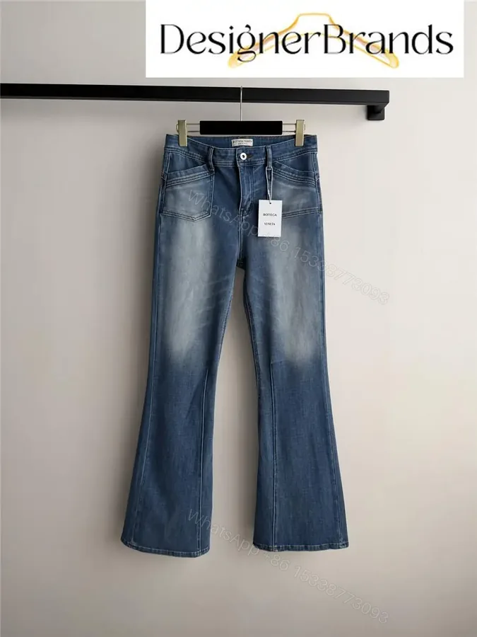 View 1 of Bottega Veneta Medium Indigo Flared Jeans