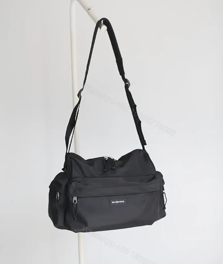 View 1 of Black Nylon Tote, Compact Utility, Minimalist Chic, Water-Resistant, Carryall