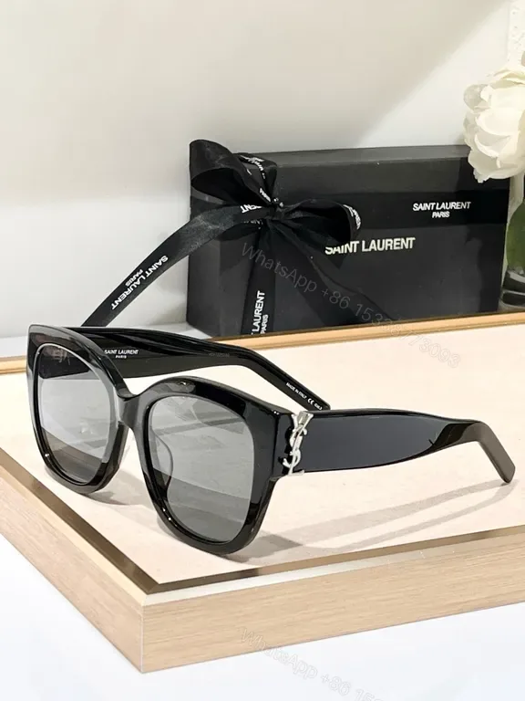 View 1 of Bold Black Acetate Sunglasses: YSL Logo Hardware Statement Sunglasses