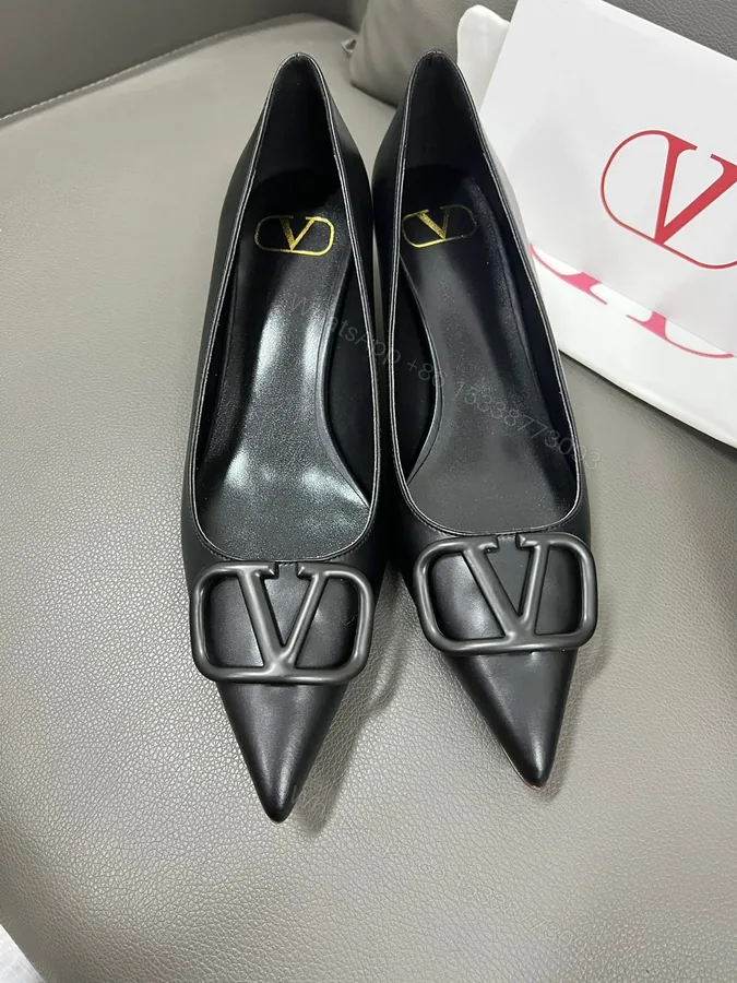 View 1 of Valentino Women Black Leather Pointed Pumps