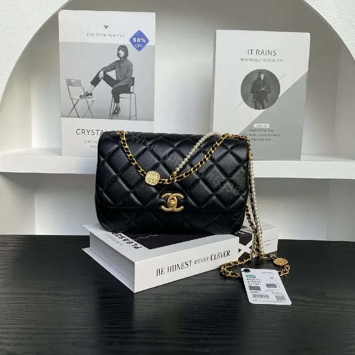 View 1 of Chic Black Quilted Mini Bag with Gold Chain