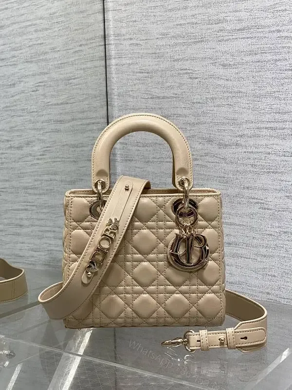 View 1 of Beige Quilted Leather Handbag with Top Handle for Everyday Luxury
