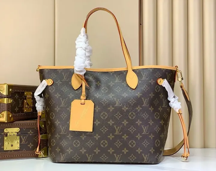 View 1 of Dark Brown Canvas Tote with Monogram Pattern and Leather Trim