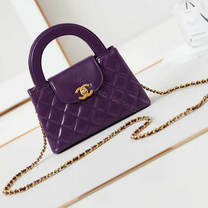 View 1 of CHANEL KELLY MINI 19 BAG IN INDIGO PURPLE CALFSKIN
