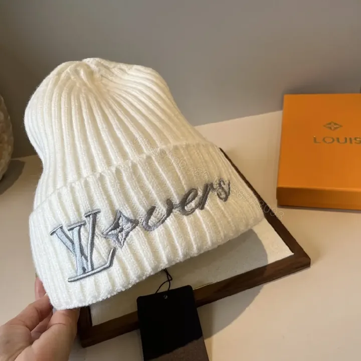 View 1 of Neutral Ivory Knit Beanie with Premium Embroidery Warmth