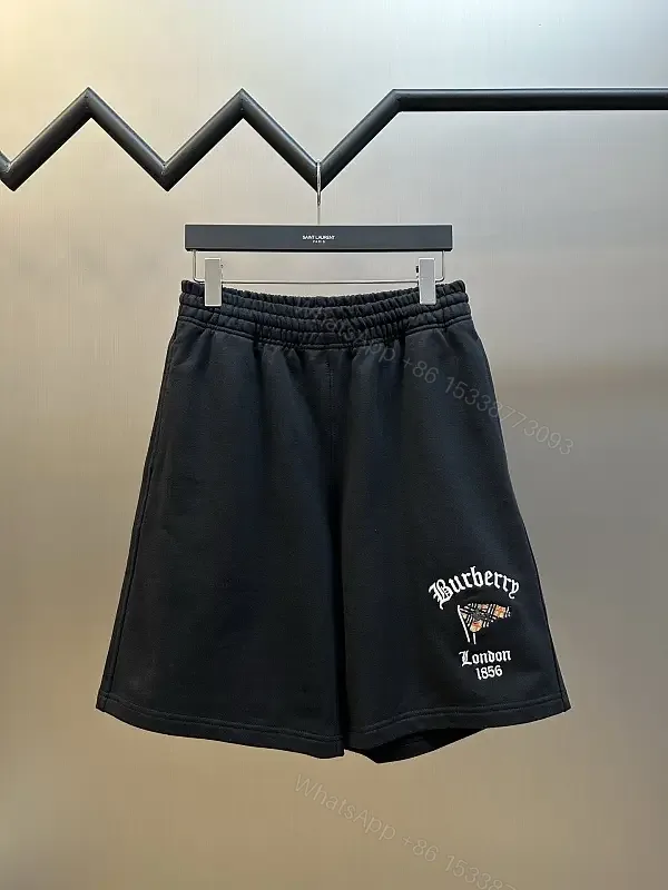 View 1 of Black Cotton Shorts Burberry London Logo Key Feature Elastic Waistband Shorts