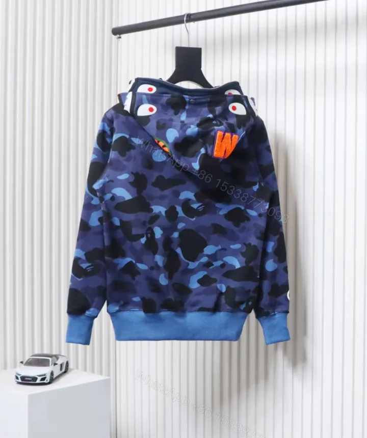 View 1 of BAPE Camouflage Double Hat Hoodie Blue