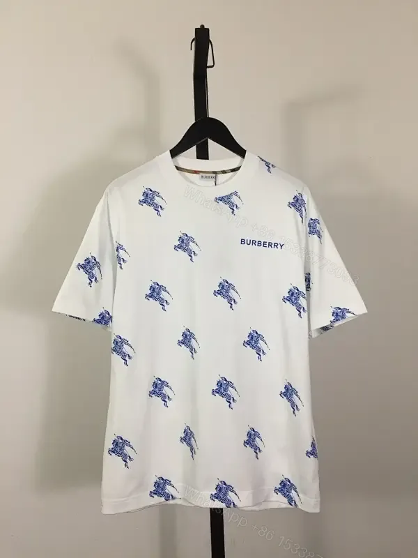 View 1 of White Burberry-Print Tee with Blue Motifs