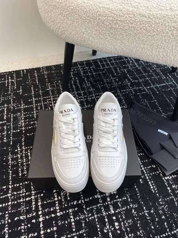 View 1 of Minimalist White Leather Suede-Trim Sneakers: Luxury Comfort
