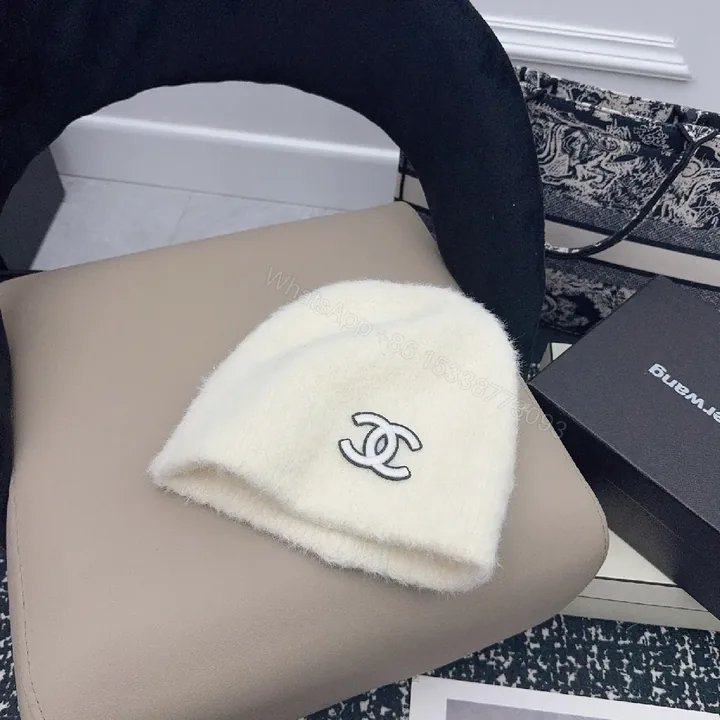 View 1 of Ivory Plush Handwarmer: Luxe Logo-Embossed, Lightweight Warmth