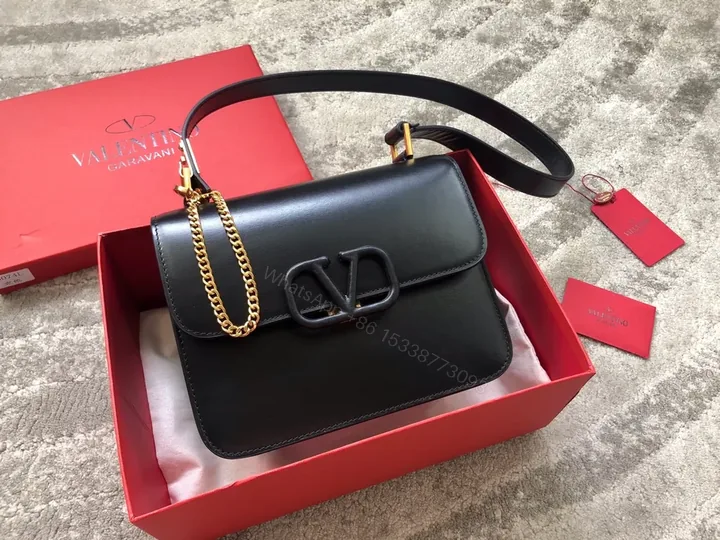 View 1 of Chic Black Leather Bag: Gold Chain, Valentino-Inspired Luxury Bag