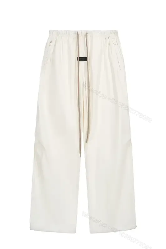 View 1 of Off-White Wide-Leg Cropped Pants with Elastic Drawstring Waist
