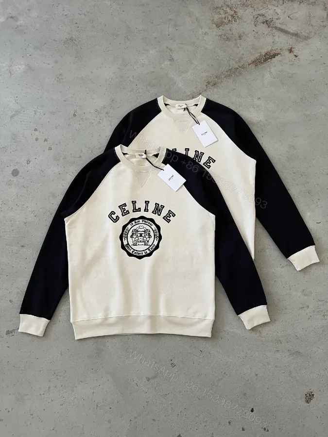 View 1 of Bold Contrast Crest Sweatshirt - Cream Body, Black Sleeves, Luxe Comfort