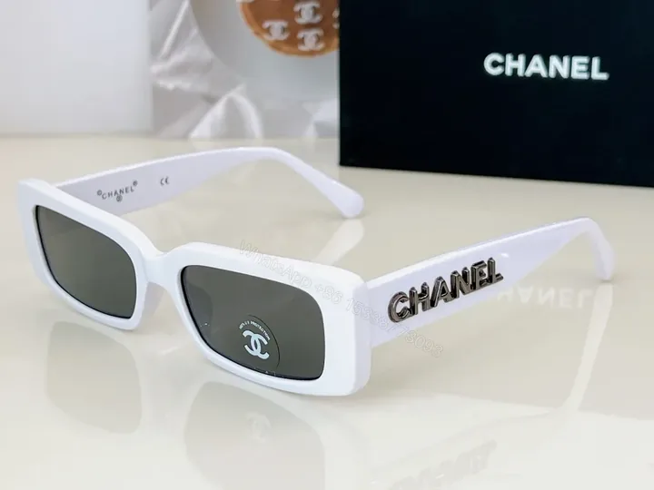 View 1 of White Acetate Sunglasses + Polarized Lenses + Modern Luxe + Chanel Branding + Sunglasses