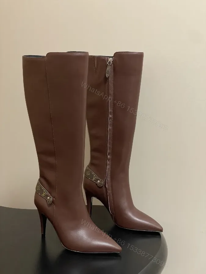 View 1 of Brown Leather Knee-High Boots with LV-Accent Details