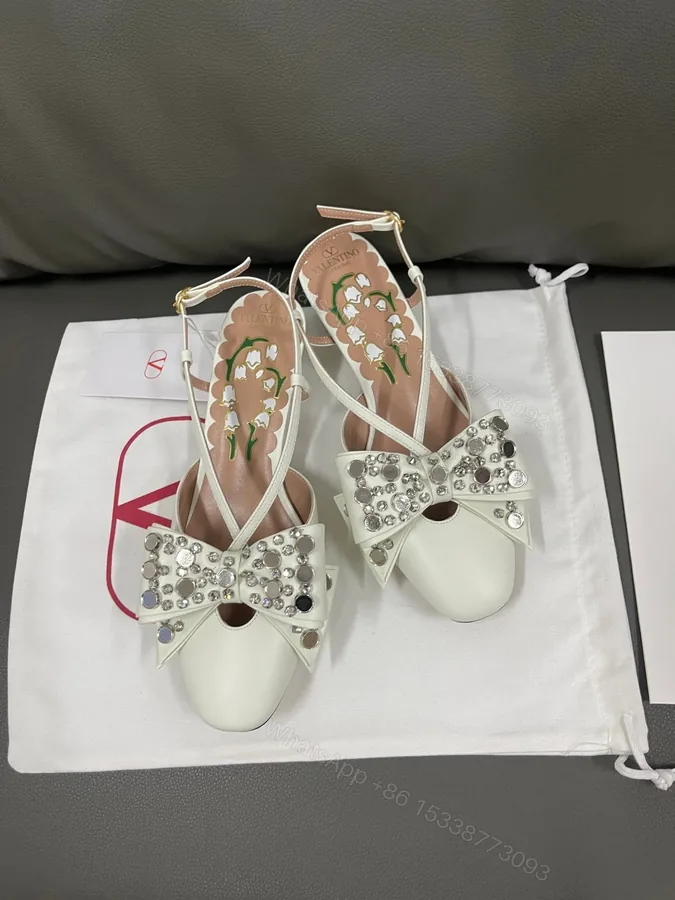 View 1 of Valentino Women White Leather Bow Embellished Flats