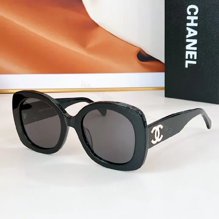 View 1 of Black Acetate Oversize Sunglasses – Gold Logo, UV 400