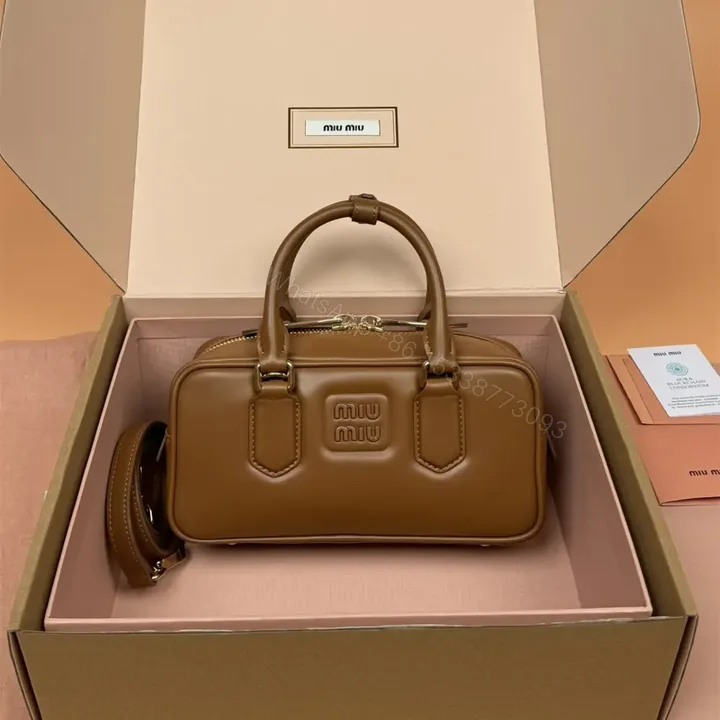 View 1 of 高仿miumiu*Arcadie系列5BB142小牛皮斜挎包干邑色免檢版