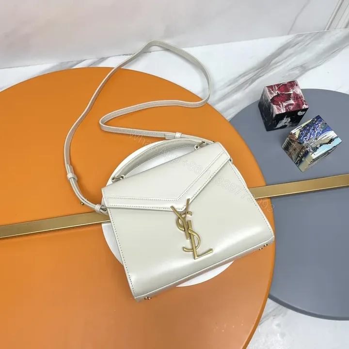 View 1 of Compact Leather Crossbody with Gold YSL Accent