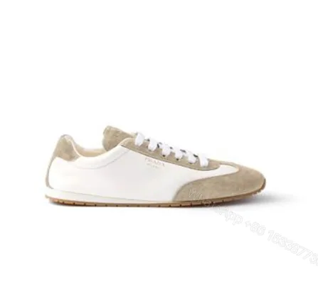 View 1 of PRADA Nappa leather and suede sneakers